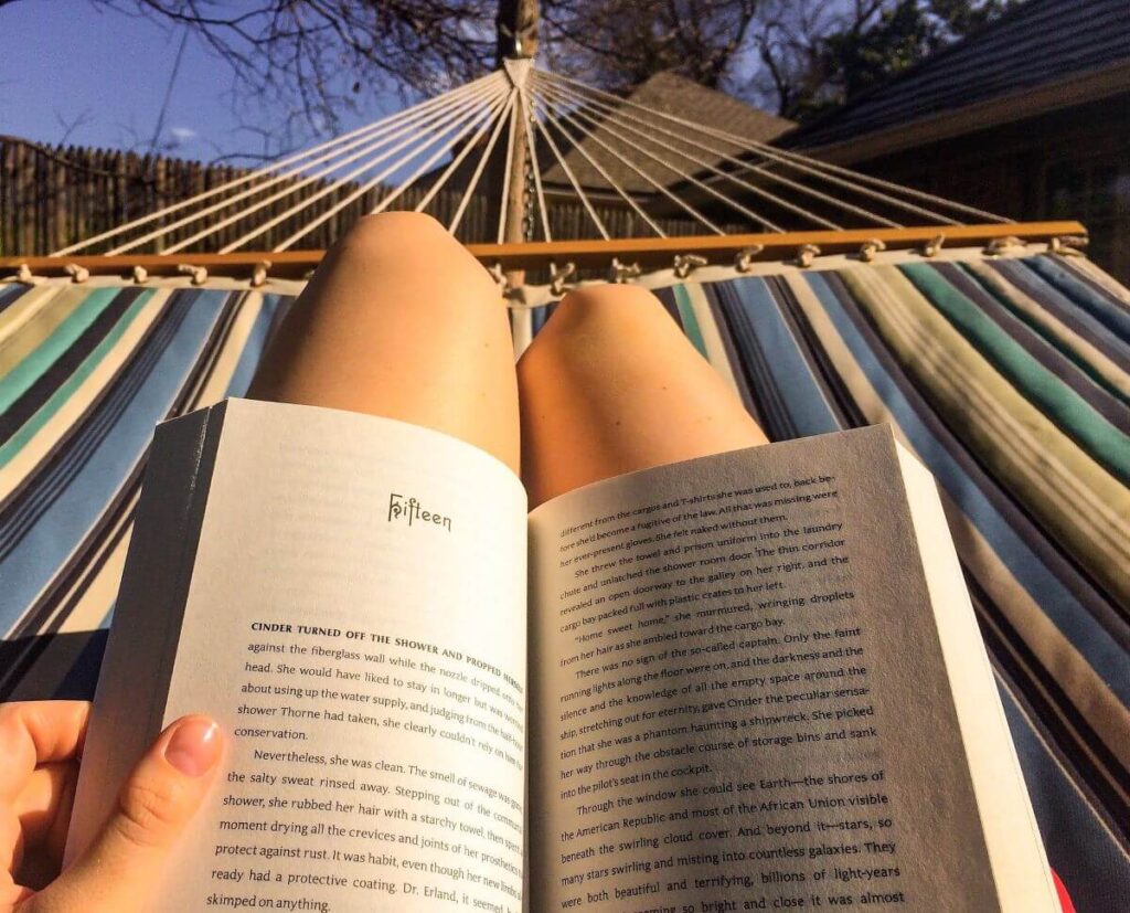 reading book in hammock